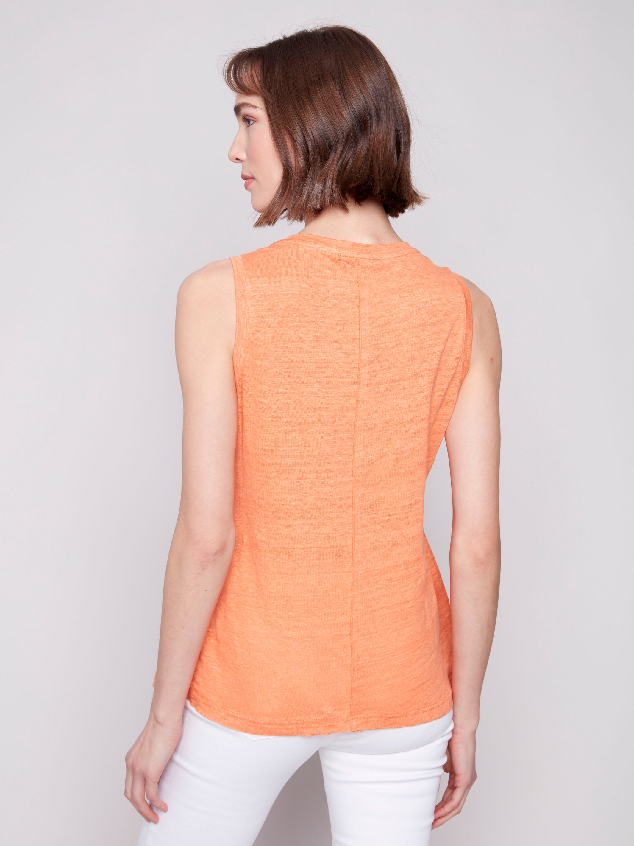 Linen blend fabric in a vibrant papaya hue adds comfort and style by Charlie B.