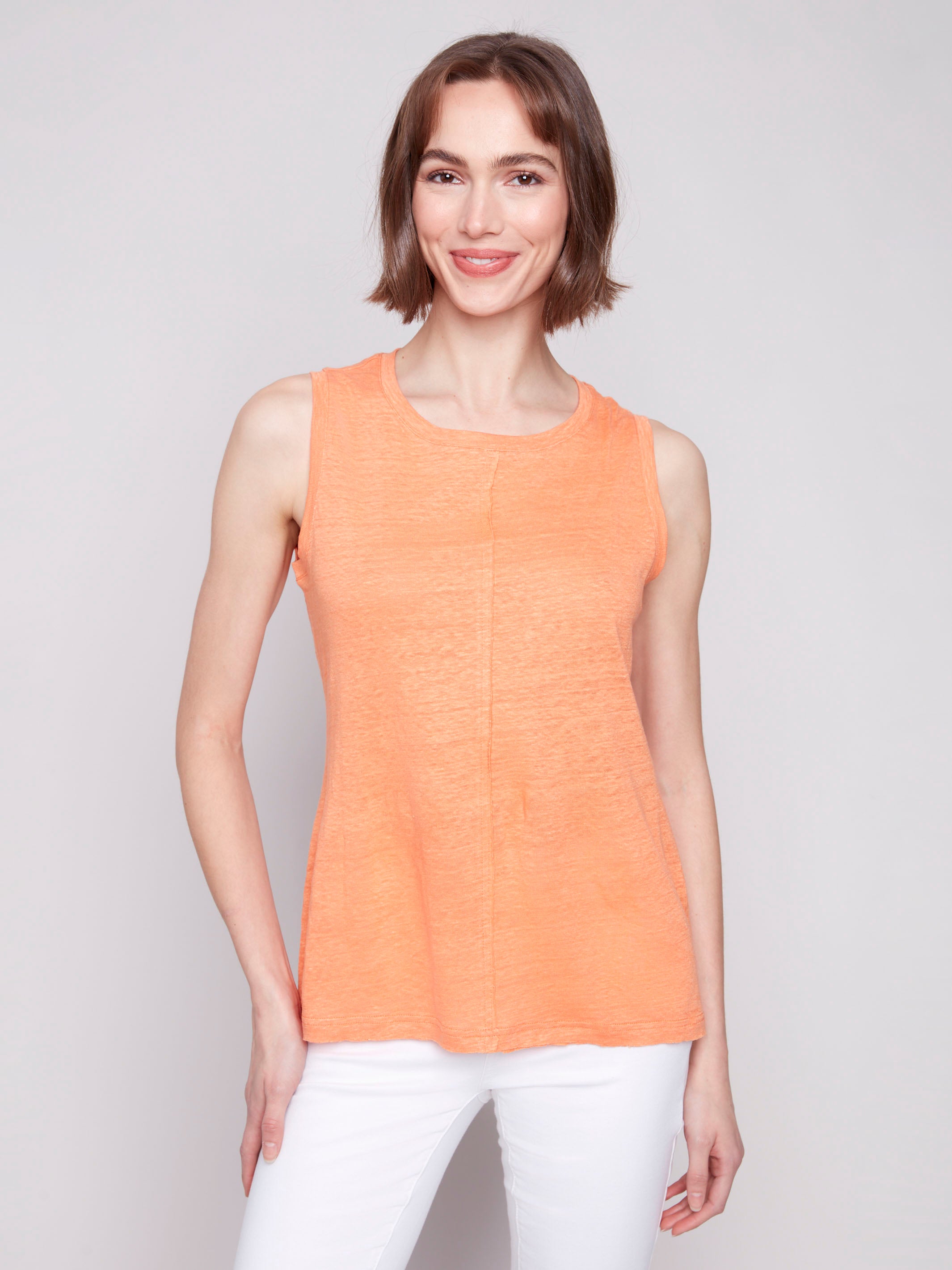 Chic papaya top showcasing refined front seam detail in linen blend by Charlie B.