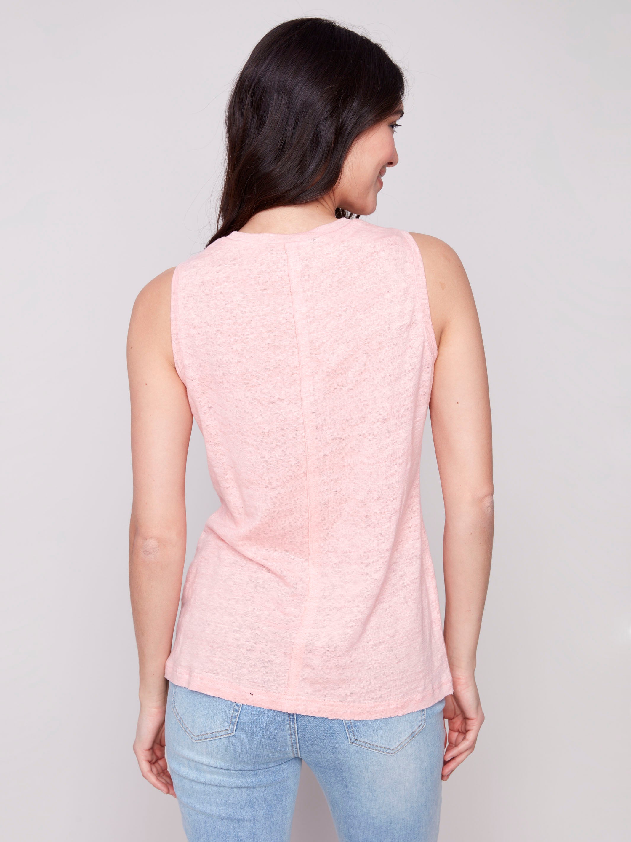 Chic guava top showcasing a unique front seam by Charlie B.