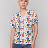 Top featuring a split neck and daisy print, crafted in a lightweight fabric by Charlie B.