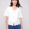 Blouse with eyelet and floral embroidery, featuring a V-neck design by Charlie B.