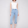 Cropped jeans with floral embroidery on cuffs and a regular rise waist by Charlie B.