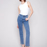 Medium blue Celine flare leg jeans with a classic five-pocket design by Charlie B.