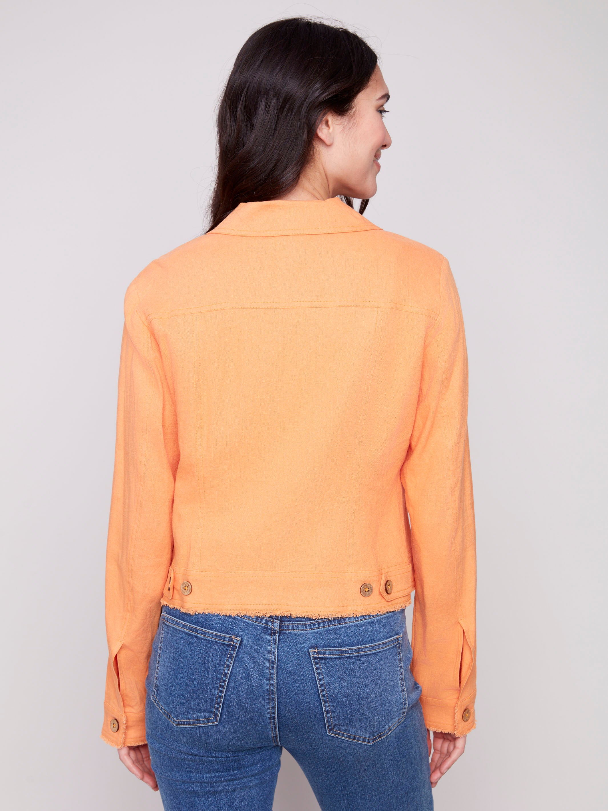 Stylish papaya jacket with front pockets and short length by Charlie B.