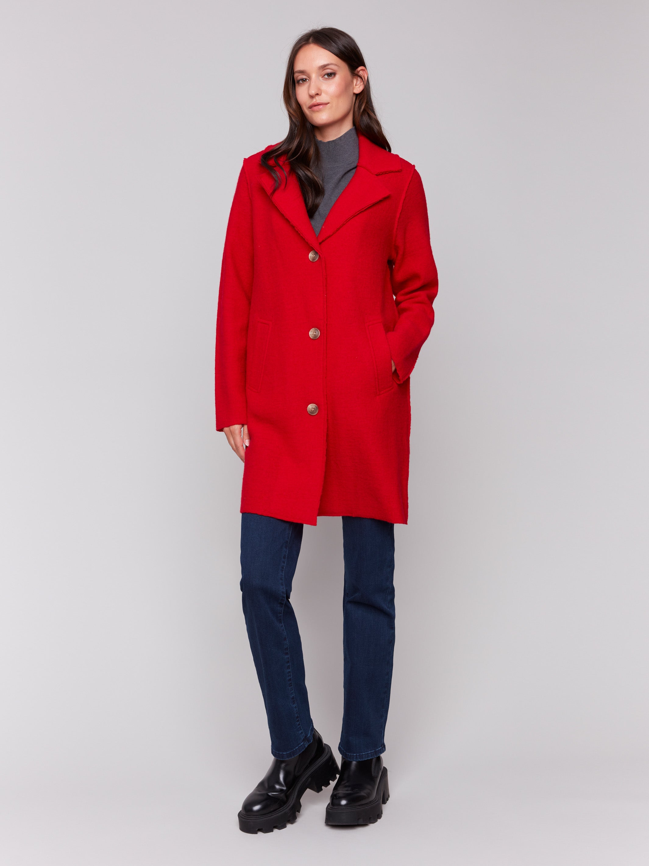 Cranberry long wool coat with lapel notch collar and button closures, featuring front welt pockets by Charlie B.