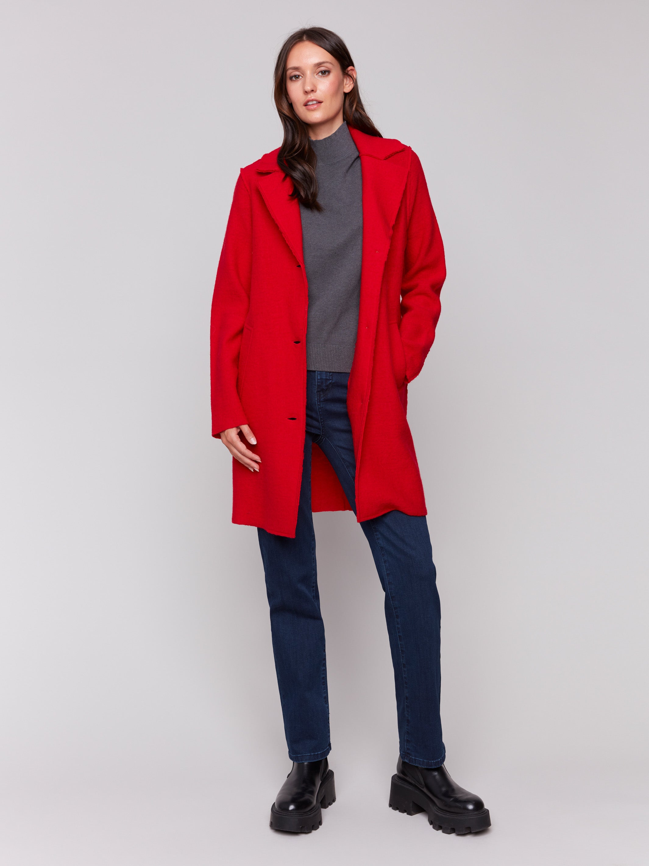 Cranberry long wool coat with lapel notch collar and button closures, featuring front welt pockets by Charlie B.