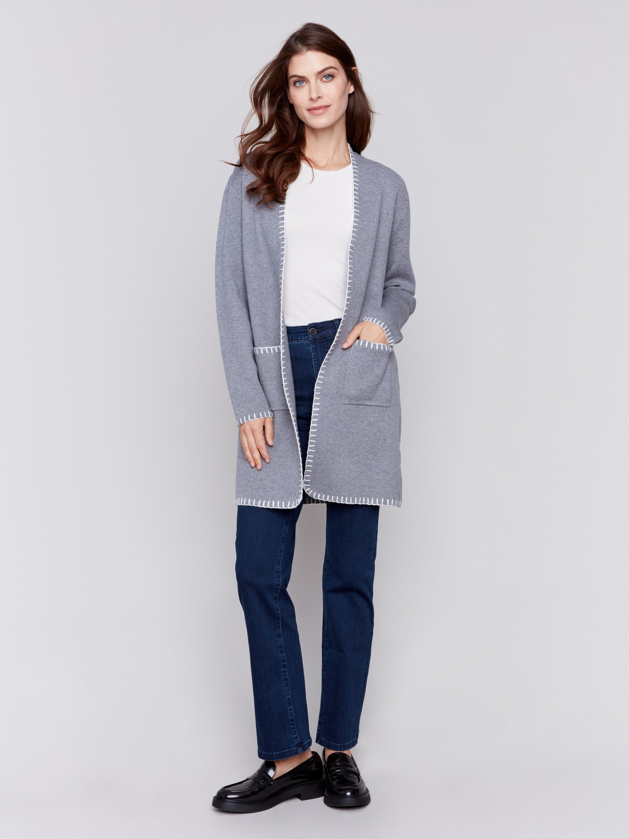 Grey long cardigan with white blanket stitch trim, featuring patch pockets and an open front by Charlie B.