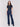 Dark blue bootcut jeans with a five-pocket design and button fly, perfect for casual or dressy occasions by Charlie B.