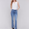 Medium blue bootcut jeans with front slits, regular rise and five-pocket design by Charlie B.