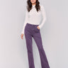 Plum bootcut twill pants with a mid-rise and bootcut fit, showcasing five-pocket design by Charlie B.