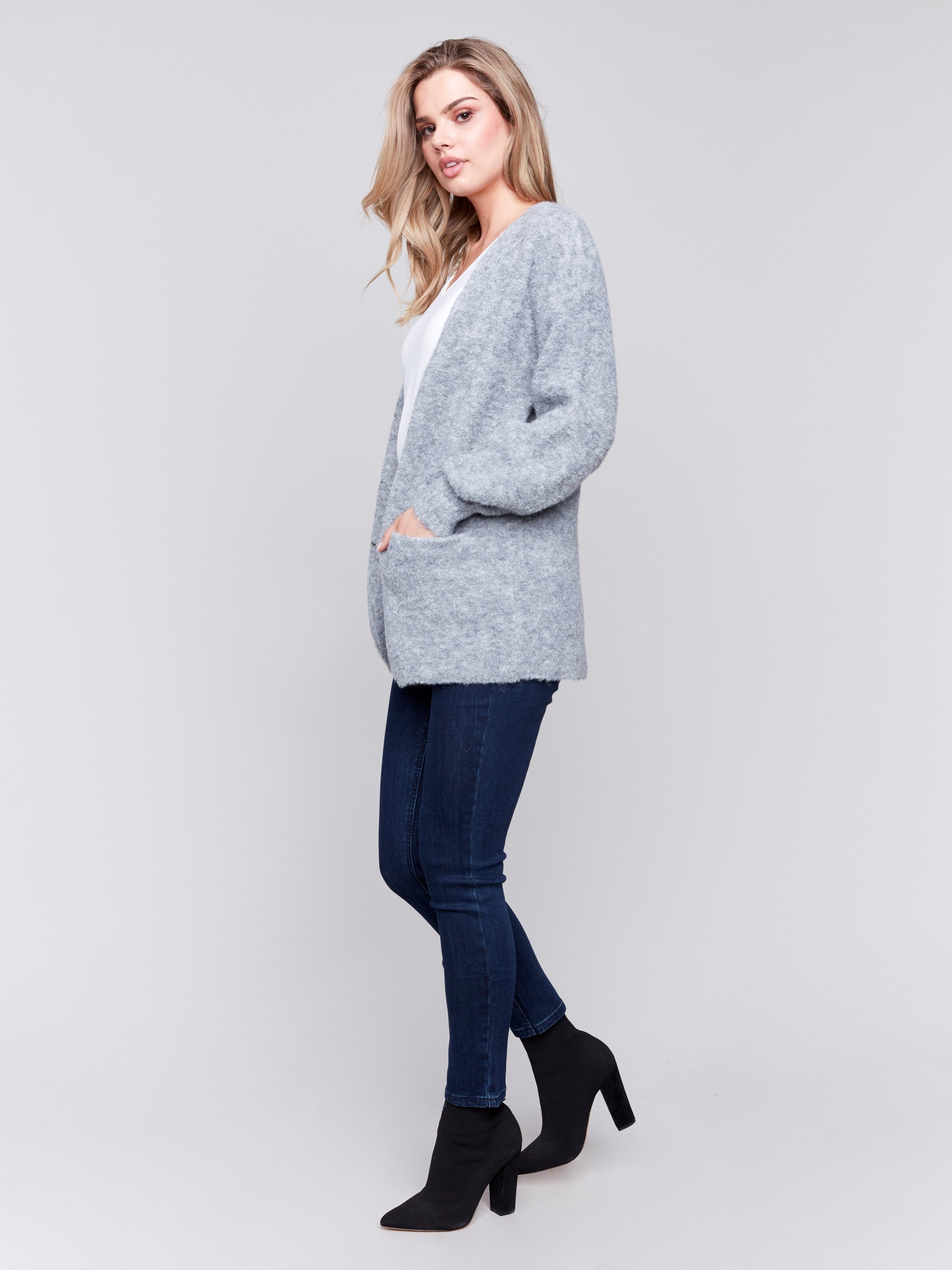 Heather grey boucle knit cardigan with front button closure and ribbed cuffs by Charlie B.