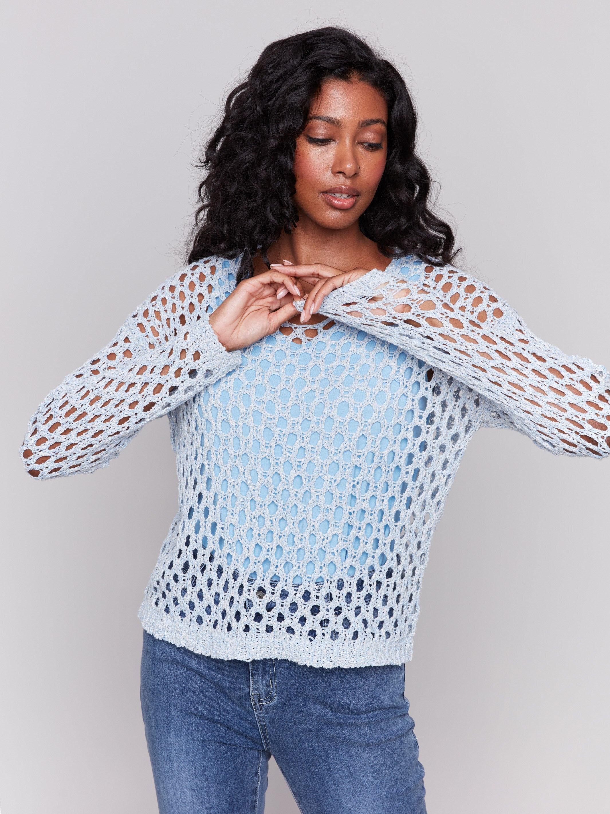 Chic open-stitch V-neck sweater with braided accents by Charlie B.