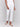 White capri pants with hem slit and side pockets by Charlie B.