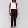 Black capri pants with hem slit and side pockets by Charlie B.