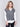 Grey soft touch sweater vest with a V-neck and relaxed fit, perfect for layering by Charlie B.