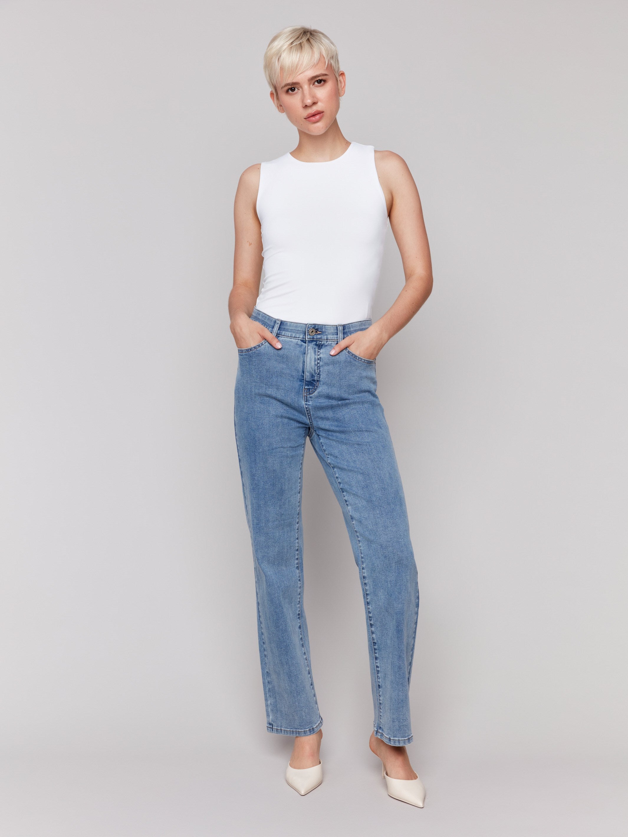 Light blue straight-leg jeans with classic five-pocket design and elastic waistband by Charlie B.