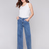 Medium blue wide-leg jeans with five-pocket design featuring a button closure and relaxed fit by Charlie B.