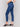 Indigo slim leg jeans with five-pocket design and button closure by Charlie B.