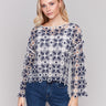 Blue and white crochet top with 3/4 sleeves, featuring a stylish design by Charlie B.