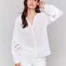 V-neck blouse with intricate embroidery by Charlie B.