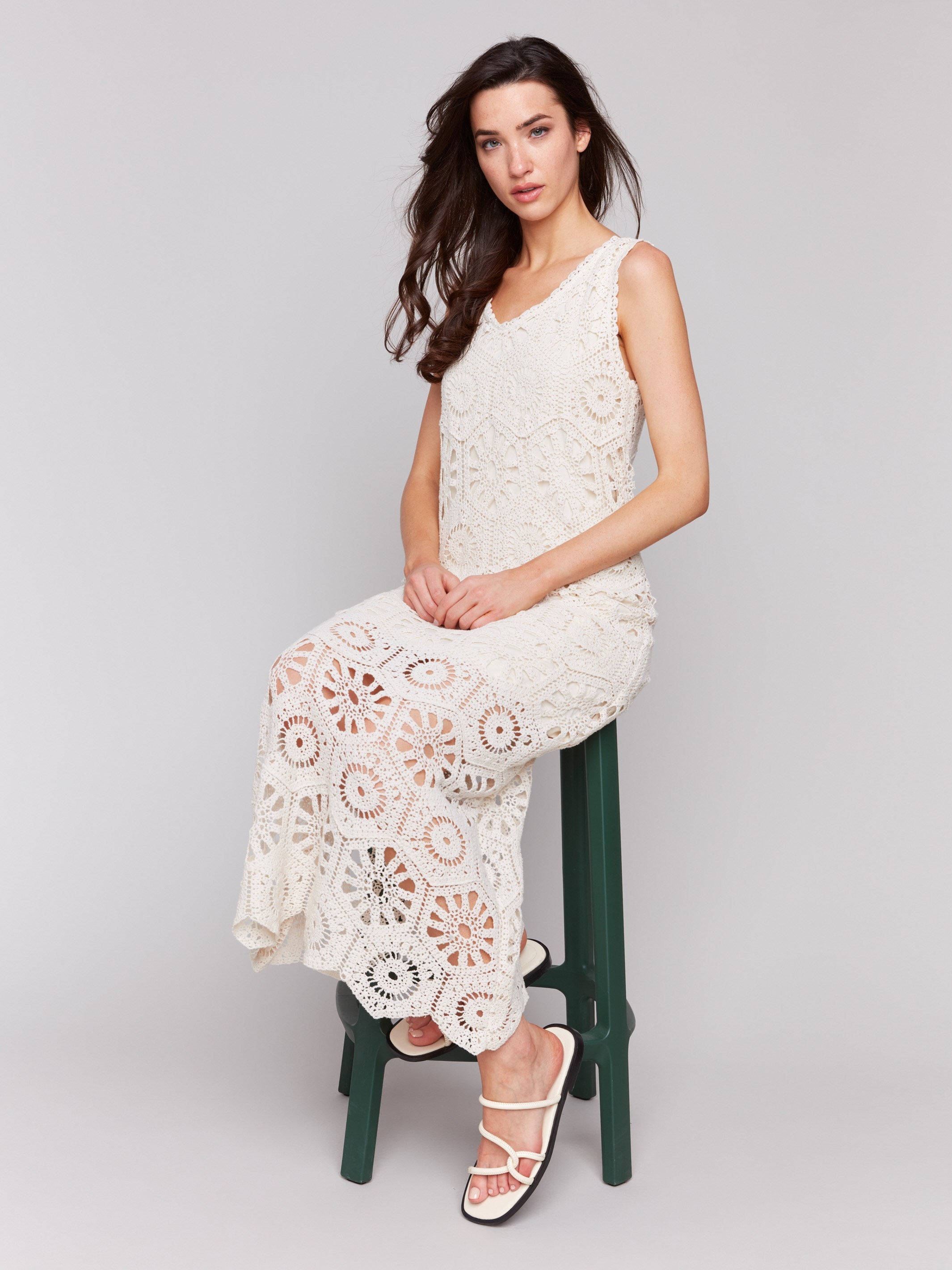 Natural crochet dress featuring a sleeveless design by Charlie B.