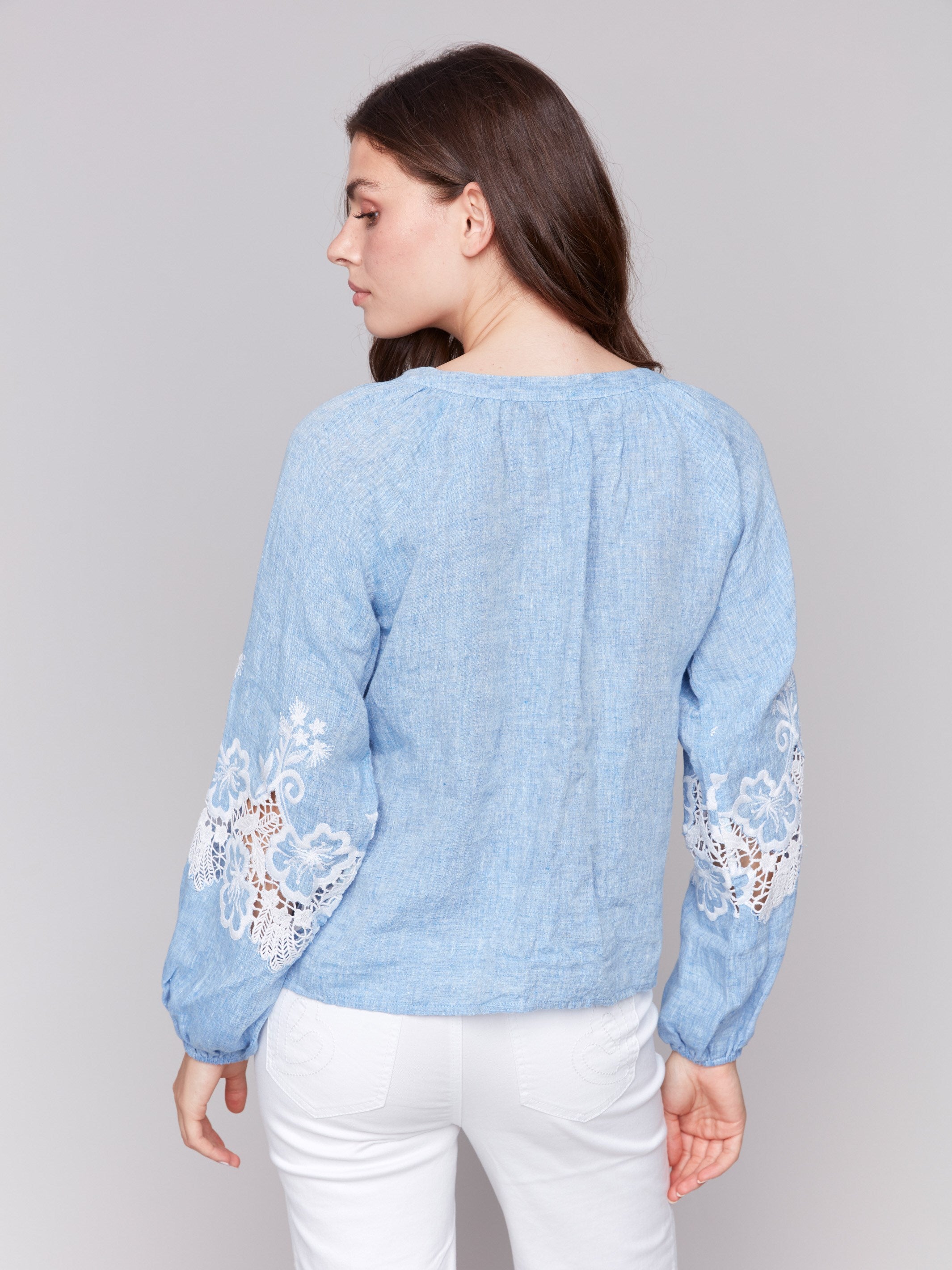 Stylish button-front closure on chambray blouse by Charlie B.