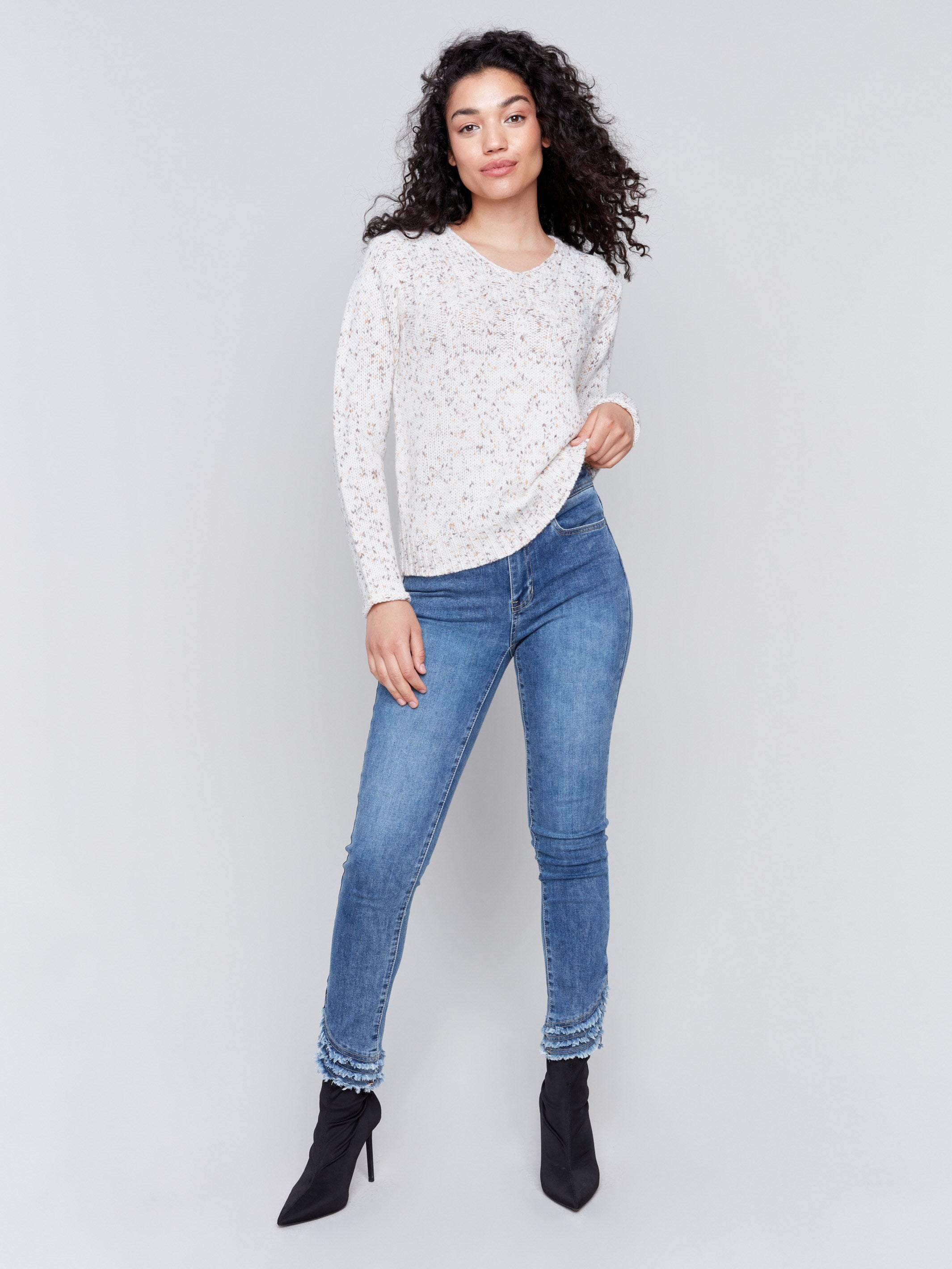 Cream nep yarn sweater with flecks and a V-neck by Charlie B, ideal for layering.