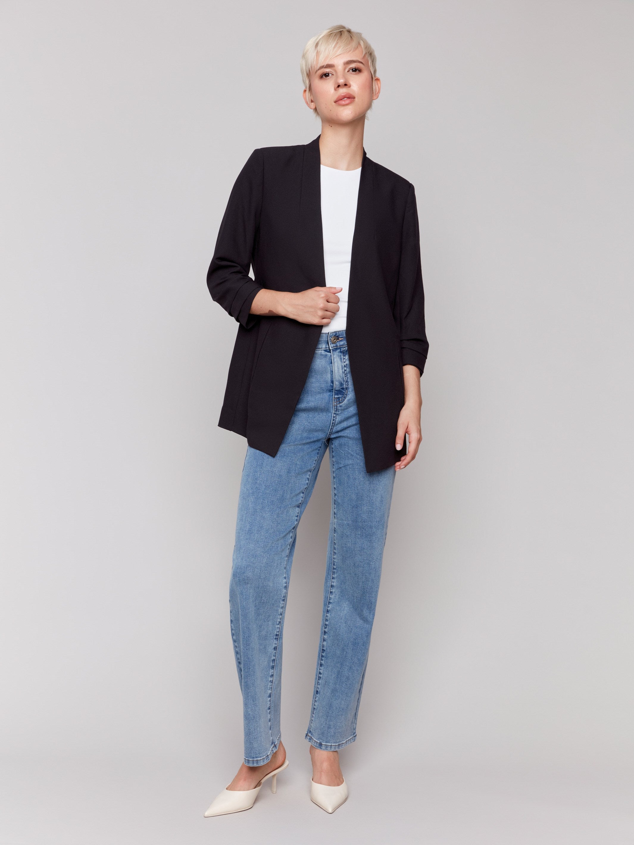 Black open-front blazer with ruched sleeves and no closure, perfect for layering by Charlie B.