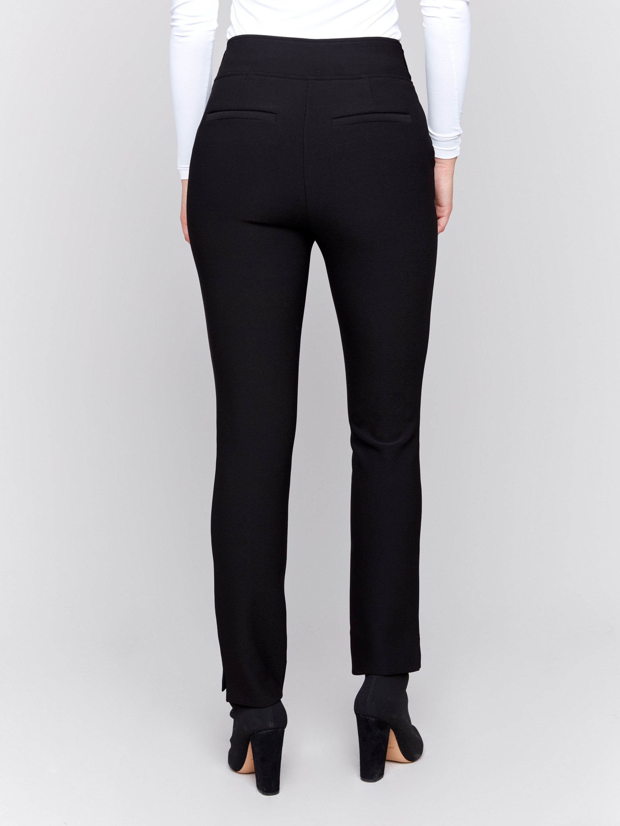 Black slim fit crepe dress pants with side and back pockets, featuring a clean and elegant design by Charlie B.