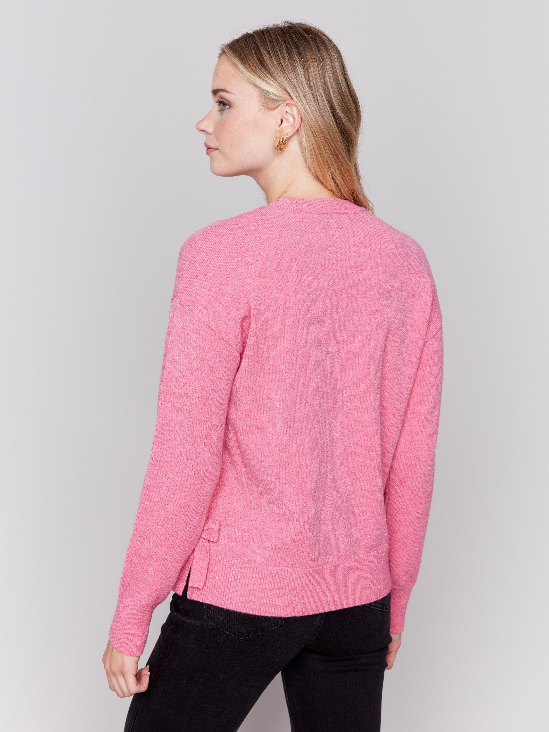 Heather magenta long-sleeve crew neck sweater with side bow details by Charlie B.