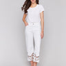 White jeans with a classic five-pocket design by Charlie B.