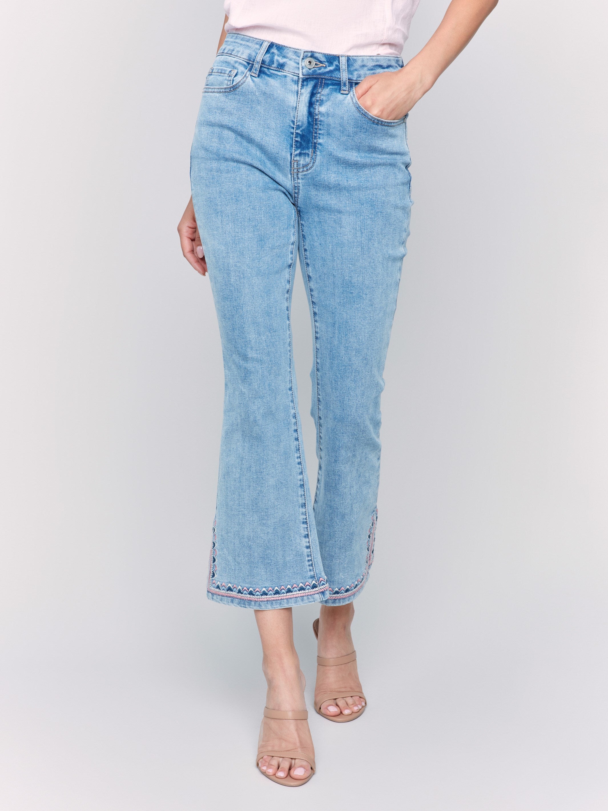 Cropped length jeans featuring classic five-pocket style by Charlie B.