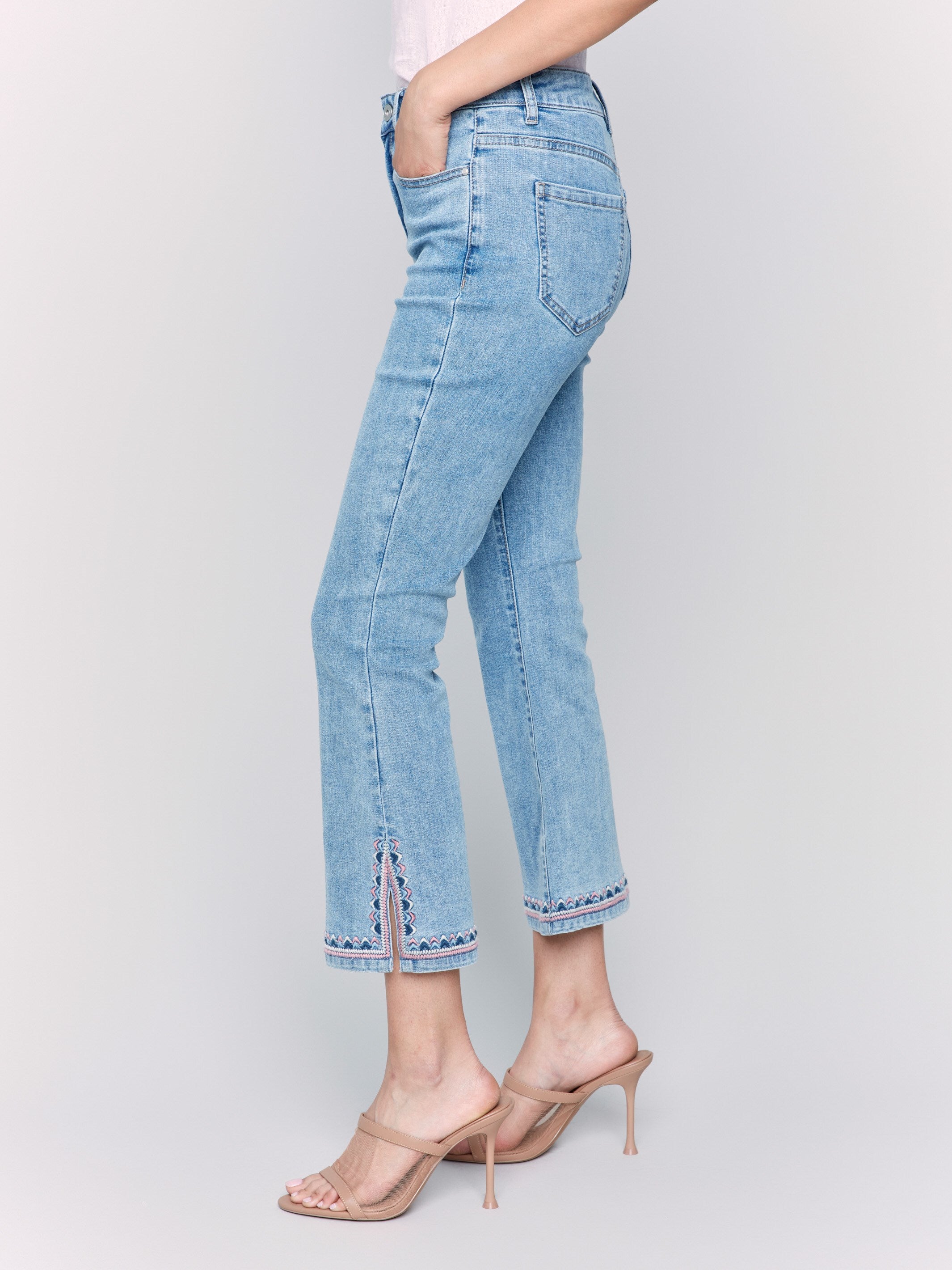 Bootcut jeans with stylish embroidered details at hem by Charlie B.