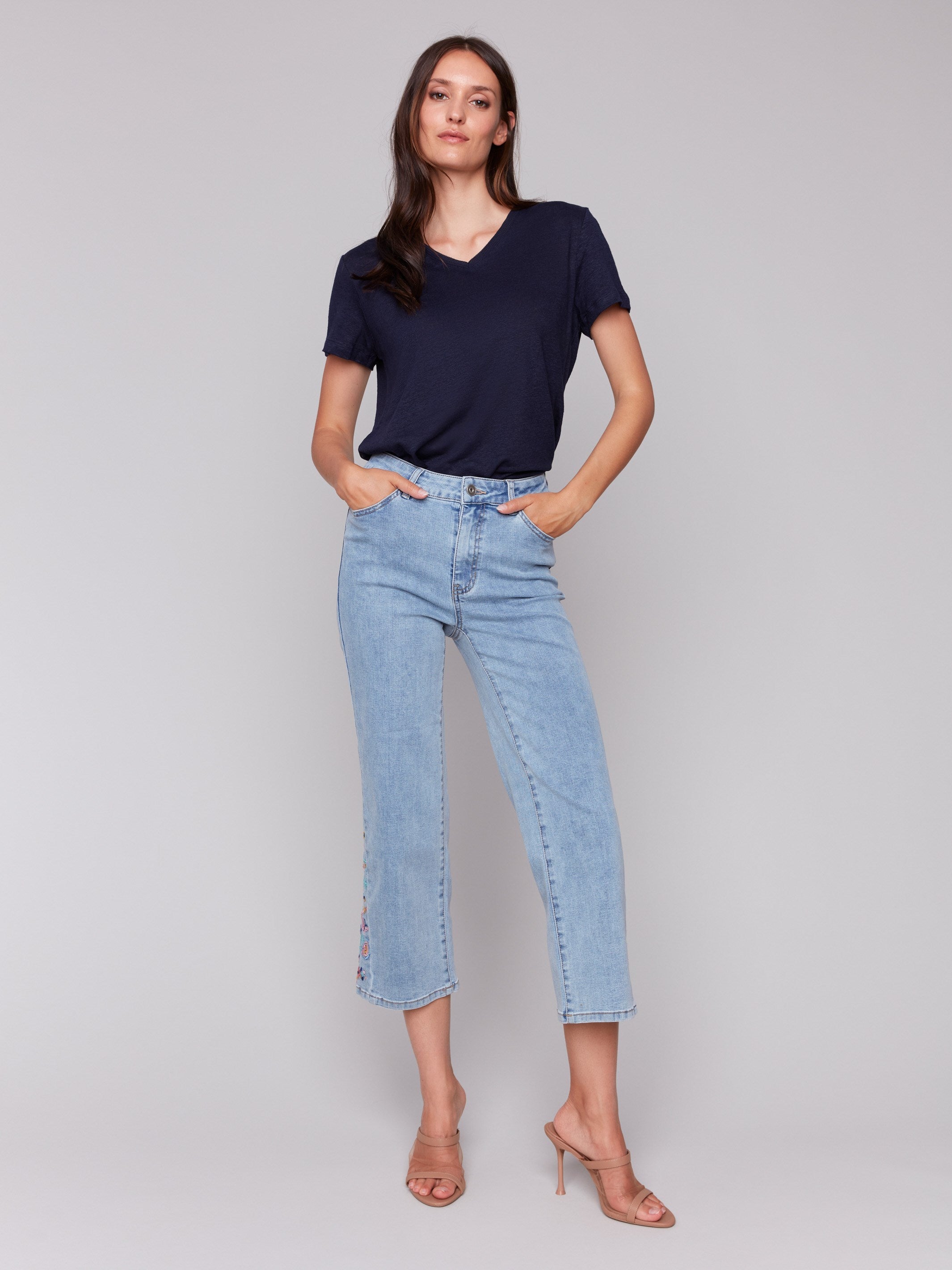 Jeans with a flare fit and stretch denim material, perfect for comfort by Charlie B.