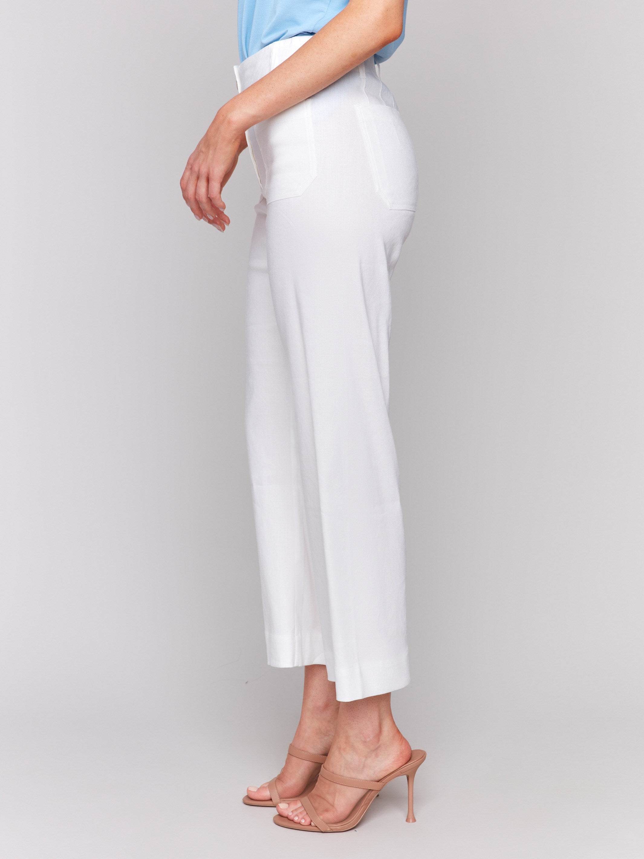 White linen blend pants featuring patch pockets by Charlie B.