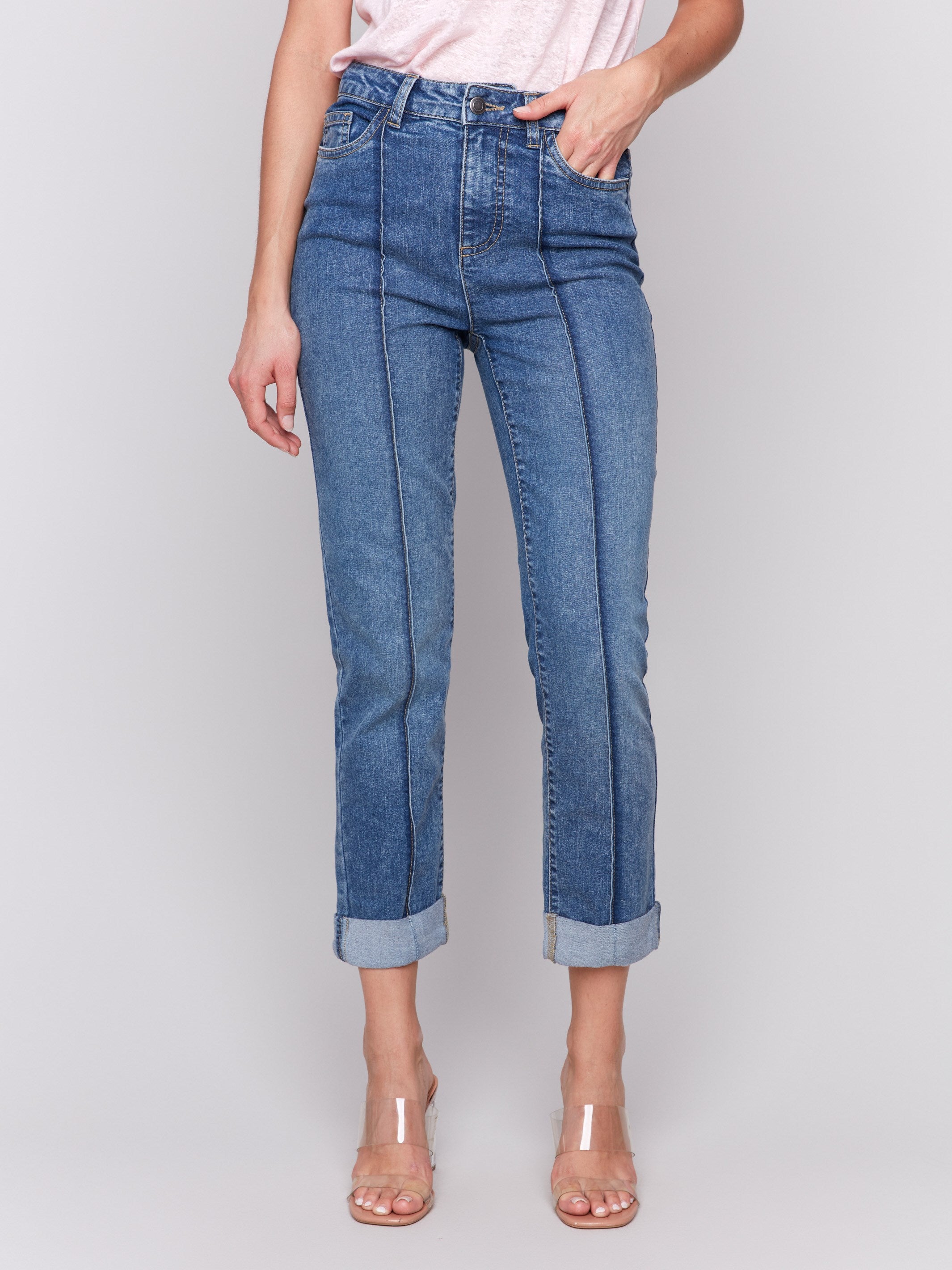 Cropped jeans featuring front pintuck detailing in medium blue by Charlie B.