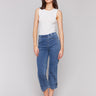 Medium blue jeans with buttoned hem tab detail, made from stretch denim material by Charlie B.