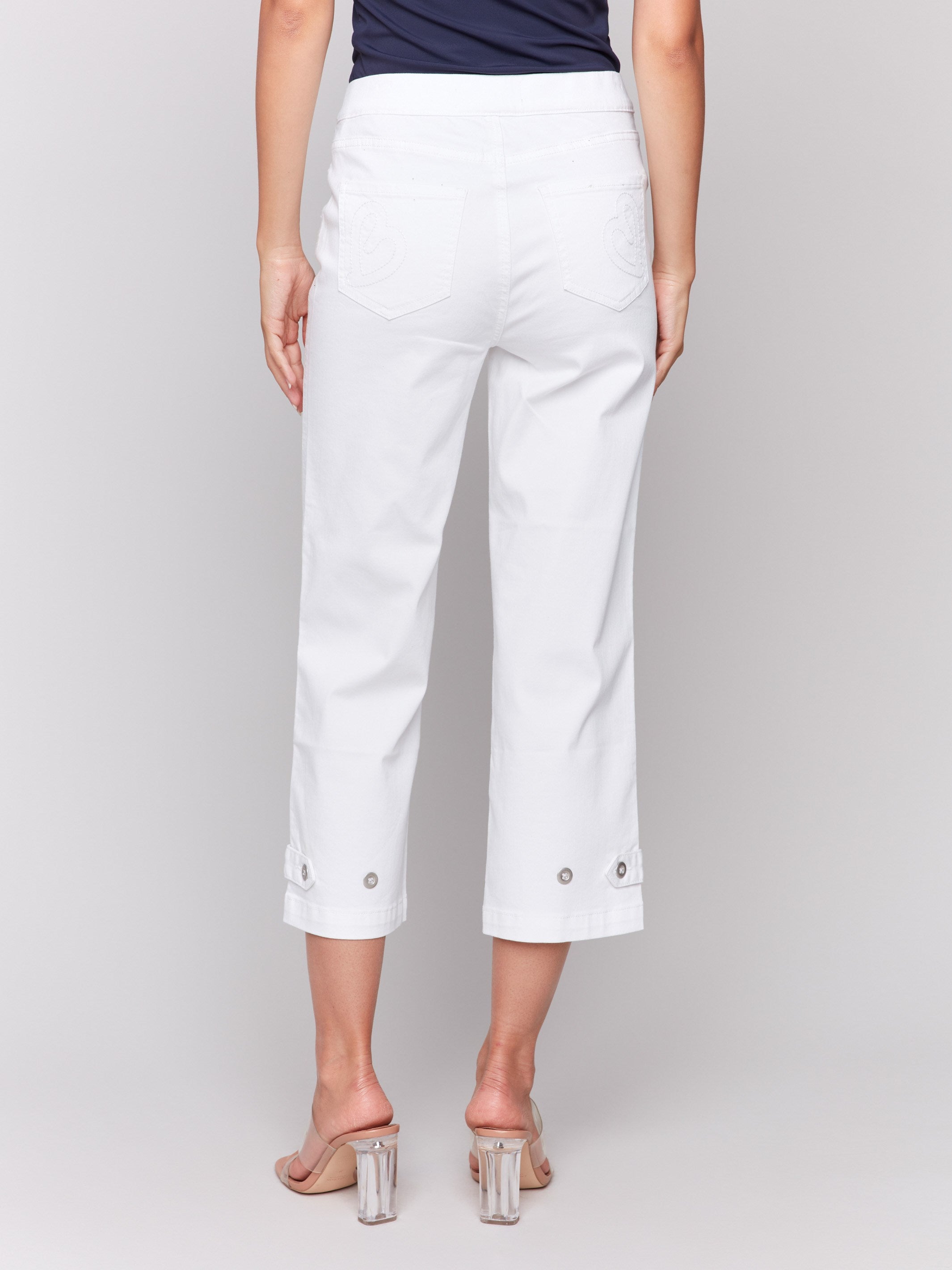 White pants with regular rise waist and back pockets by Charlie B.