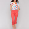 Fiesta-colored jeans featuring a slim fit design, ideal for a chic summer look by Charlie B.