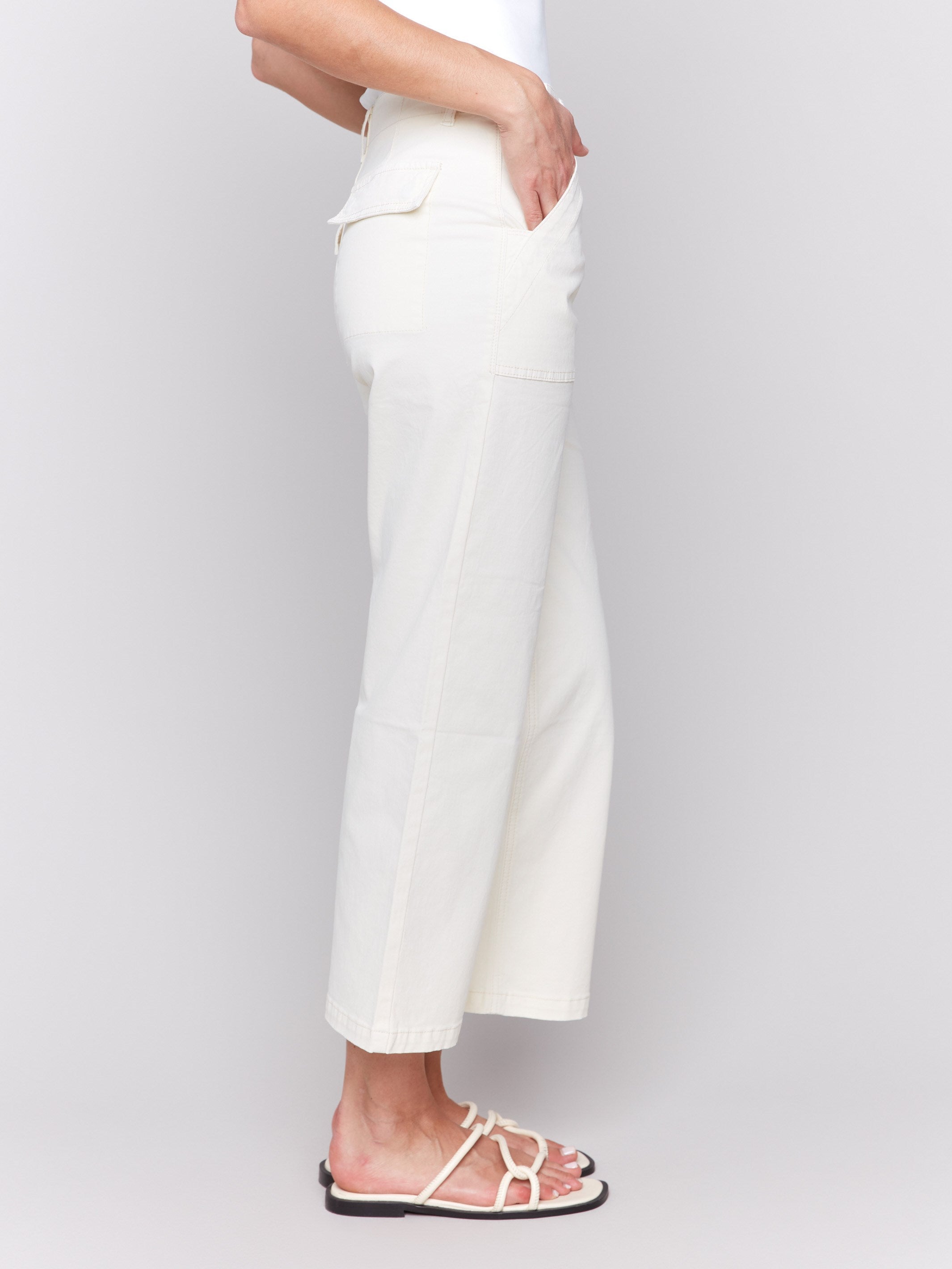 Cropped twill pants in natural color featuring utility style pockets by Charlie B.