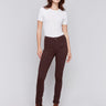 Mocha brown slim-leg twill jeans with a cuffed hem and a classic five-pocket design by Charlie B.