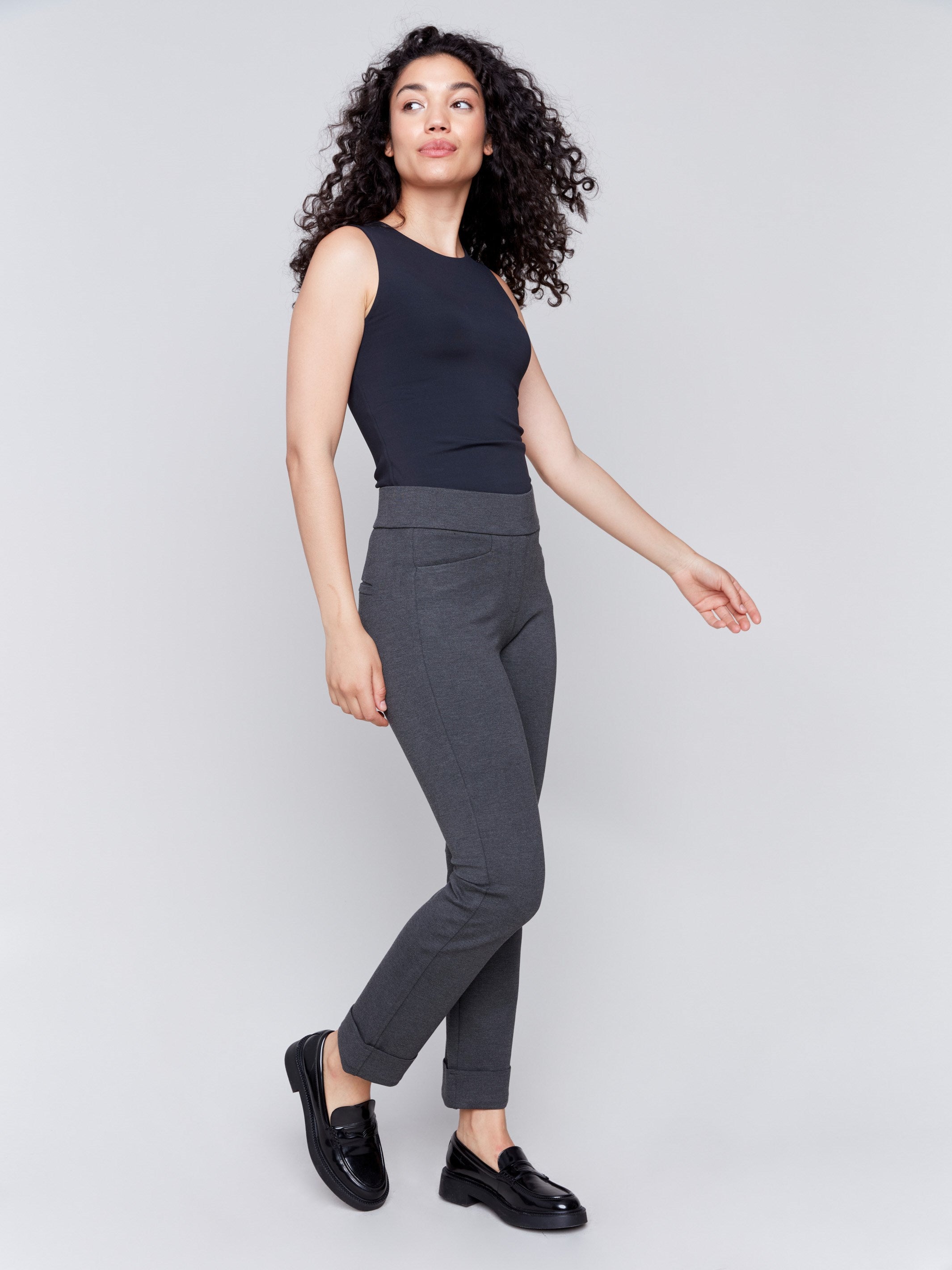 Charcoal grey cuffed ponte pants featuring a straight leg fit, with welt pockets and a cuffed hem by Charlie B.