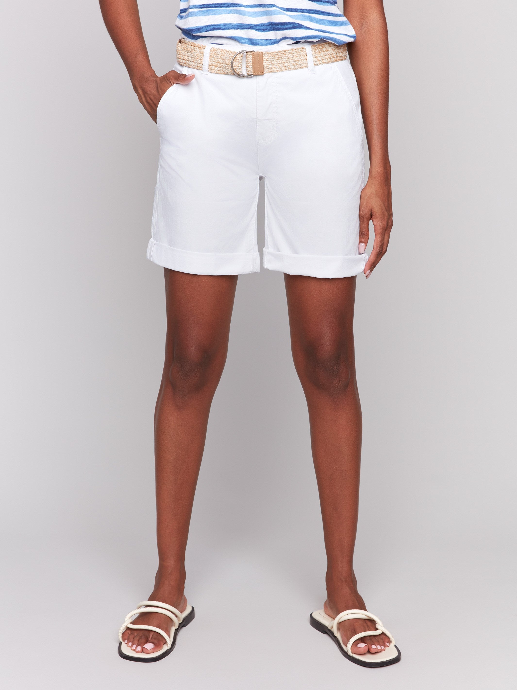 White shorts designed with rolled cuffs and stretch twill fabric by Charlie B.