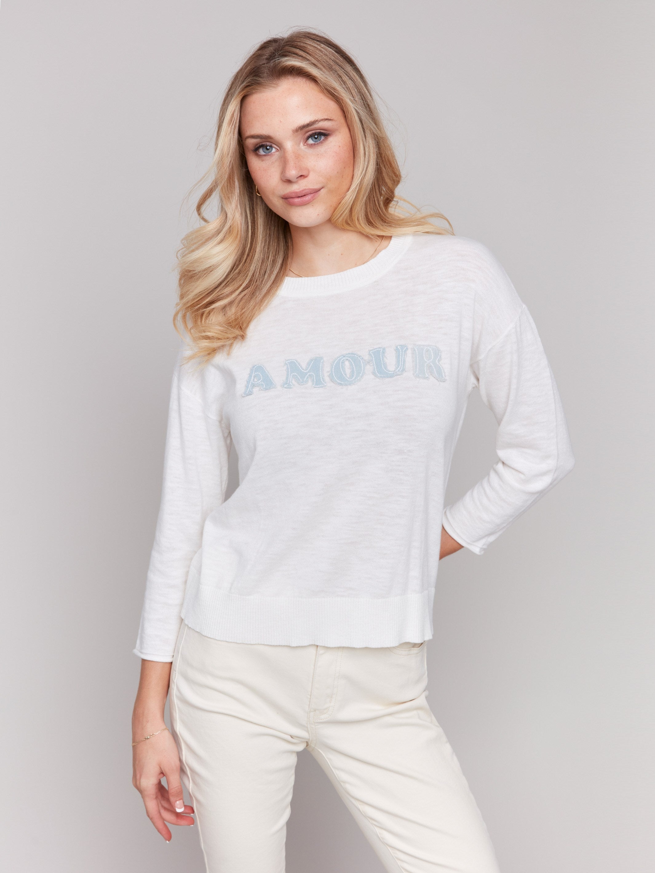 White cotton sweater with denim 'Amour' patch and crew neck by Charlie B.