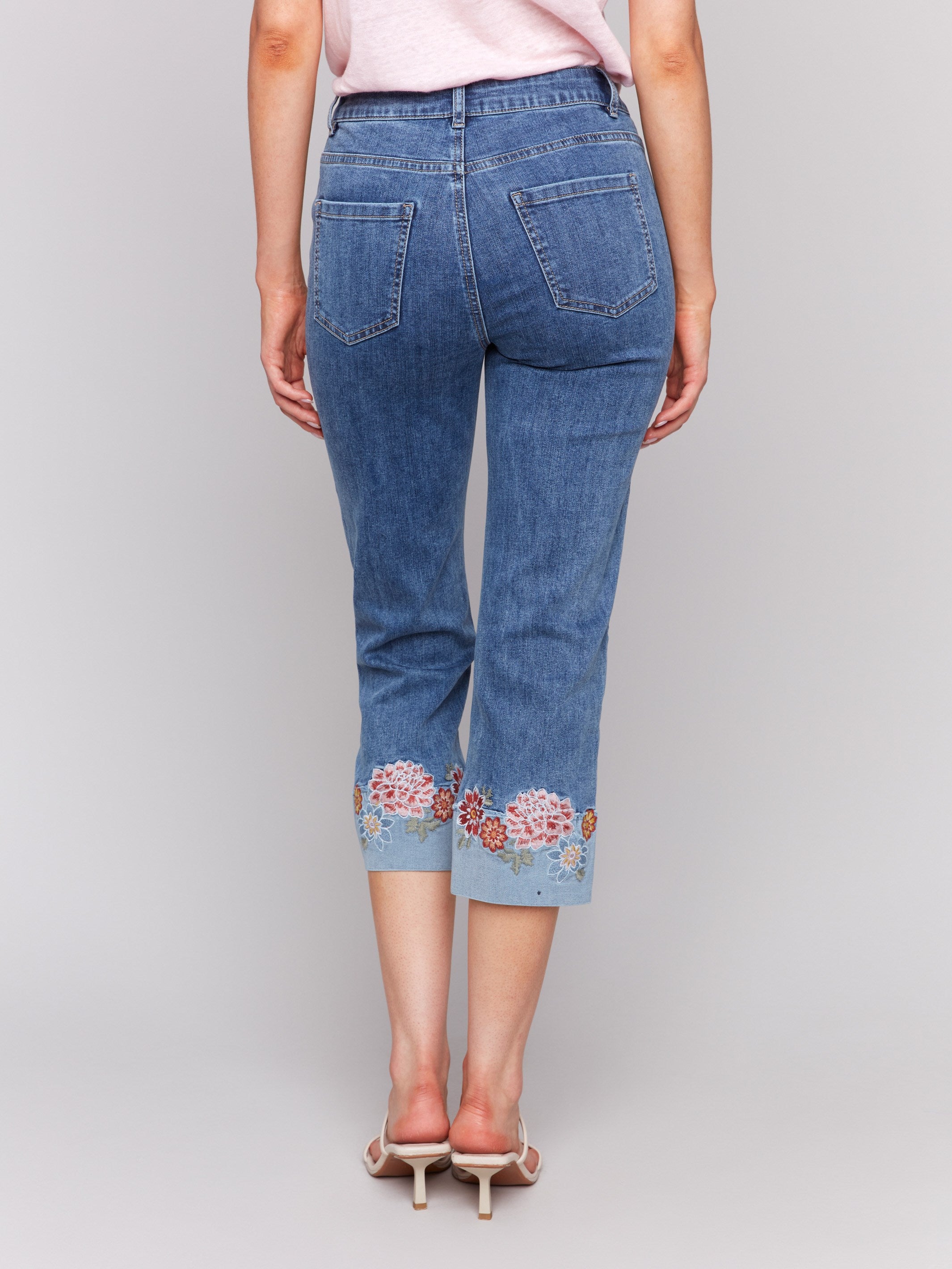 Regular rise waist jeans with floral embroidery by Charlie B.