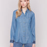 Denim-colored long sleeve Tencel shirt featuring embroidered cuffs and front button closure by Charlie B.