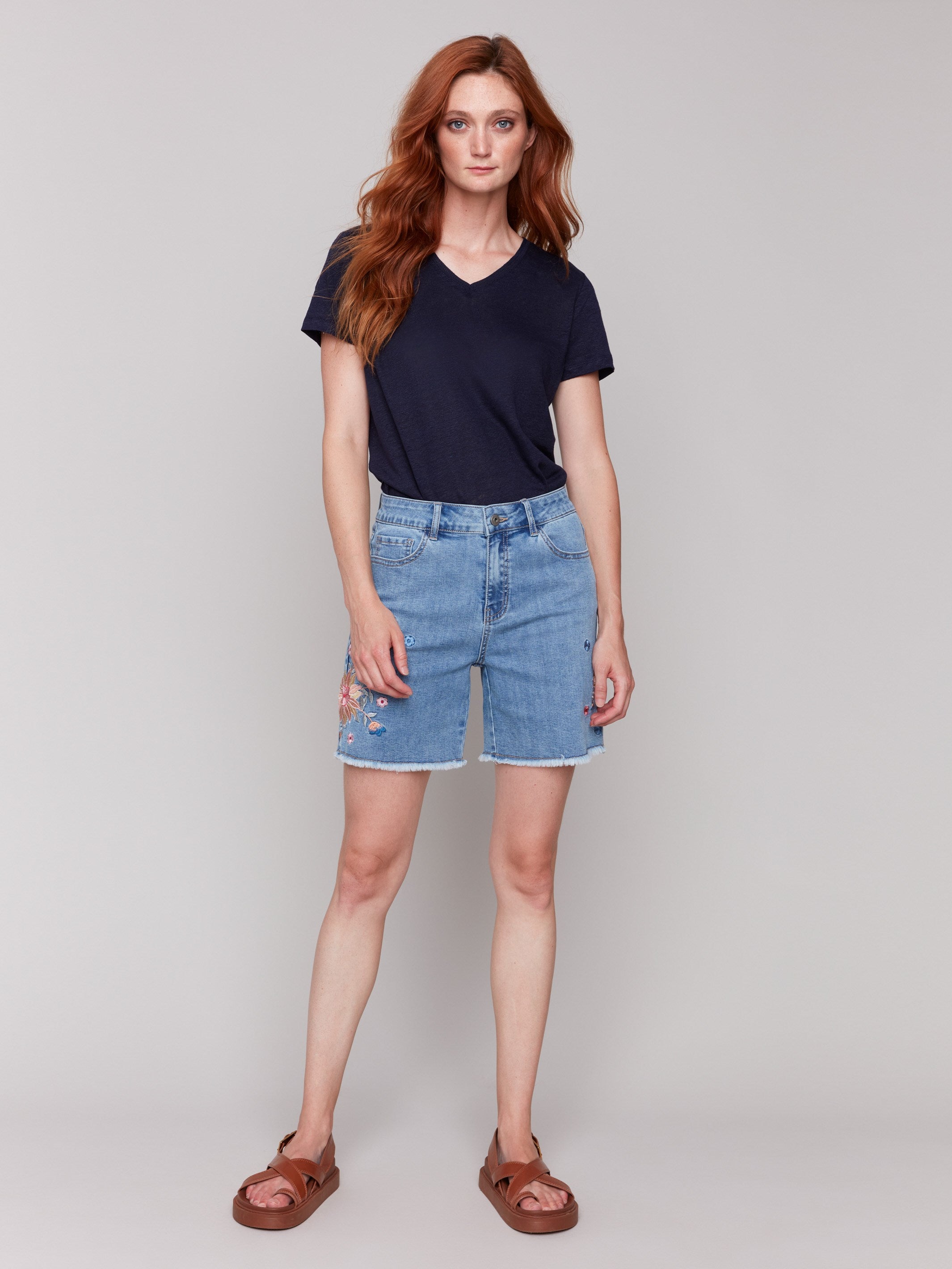 Denim shorts featuring a five-pocket design by Charlie B.