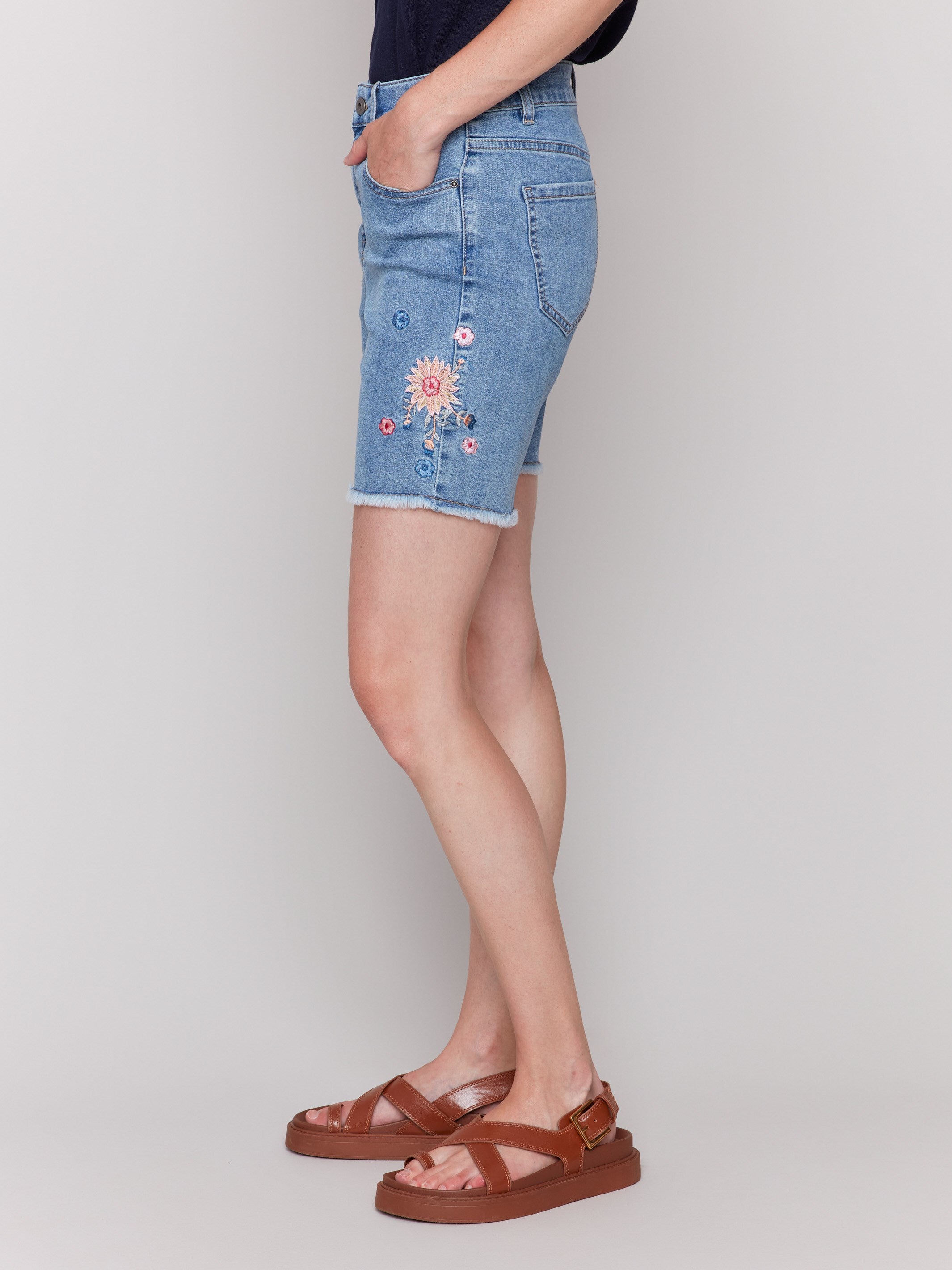 Embroidered floral pattern on regular rise waist shorts by Charlie B.