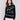 Black jacquard knit sweater featuring abstract embroidery and a round hemline by Charlie B.