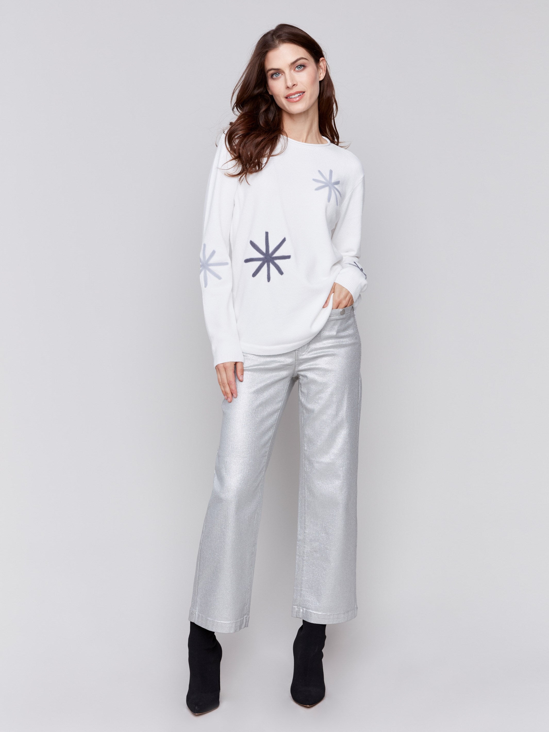 Ecru whitelong-sleeve sweater with snowflake embroidery and rounded hem by Charlie B.